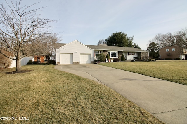 ranch-style home featuring a garage and a front yard