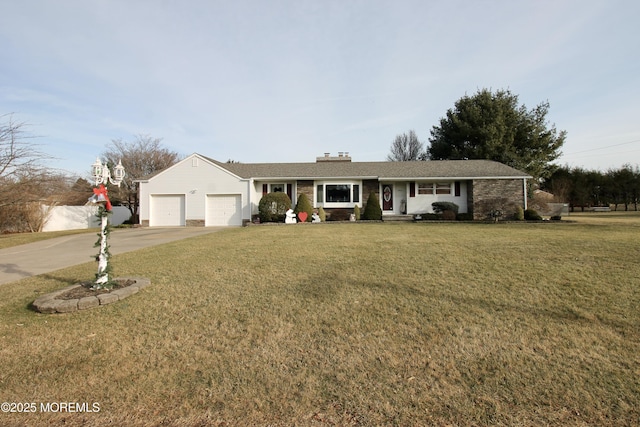 ranch-style home featuring a garage and a front lawn