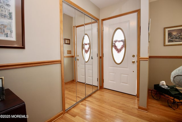 entrance foyer with light wood-type flooring