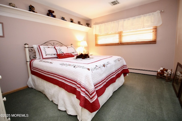 carpeted bedroom featuring baseboard heating