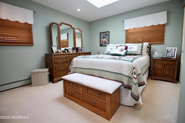 carpeted bedroom featuring baseboard heating