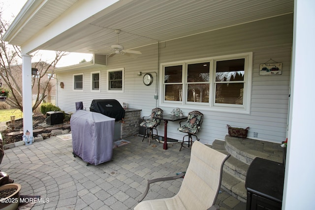 view of patio / terrace with area for grilling and ceiling fan