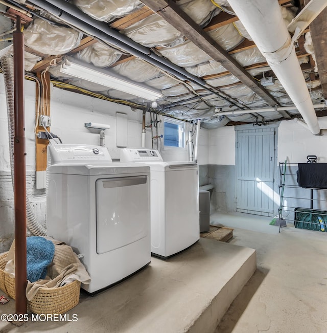 laundry room with washer and clothes dryer