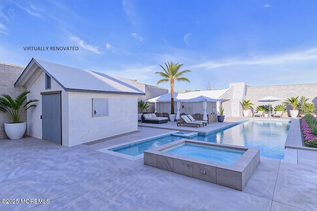 view of swimming pool featuring an in ground hot tub, outdoor lounge area, and a patio area