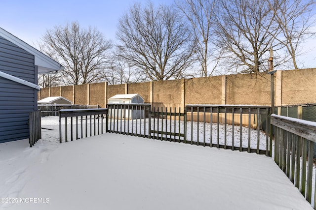 view of snow covered deck