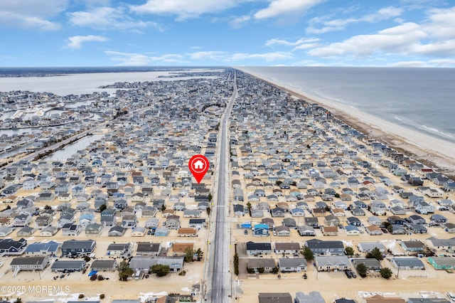 aerial view featuring a beach view and a water view