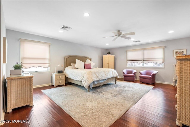 bedroom featuring dark wood-type flooring and ceiling fan