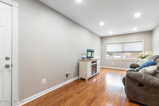 living room with wood-type flooring