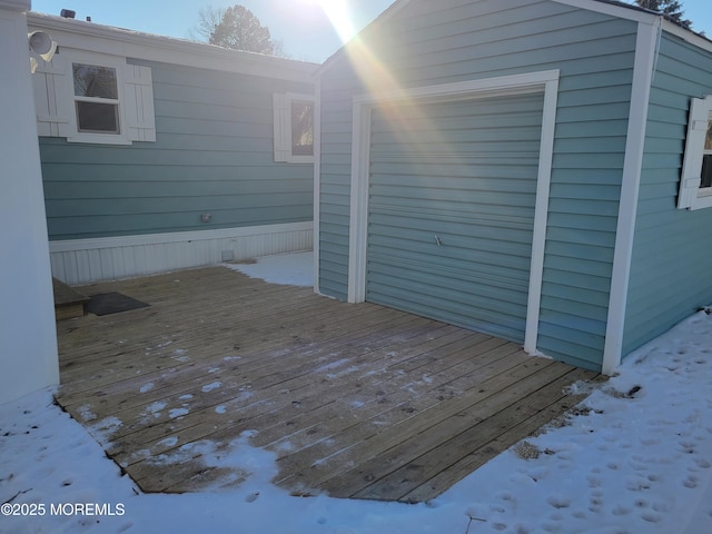 view of snow covered deck