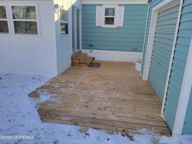 view of snow covered deck