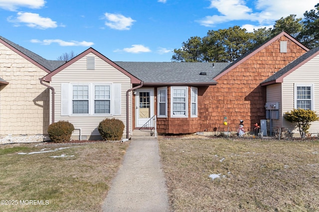 view of front of home with a front yard