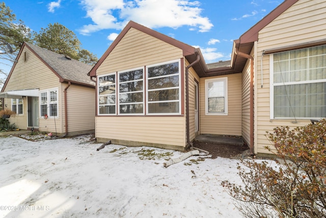 view of snow covered property