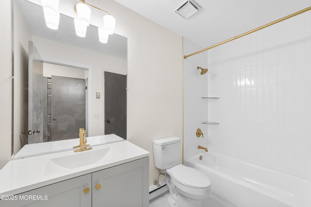 full bathroom with vanity, bathtub / shower combination, and toilet