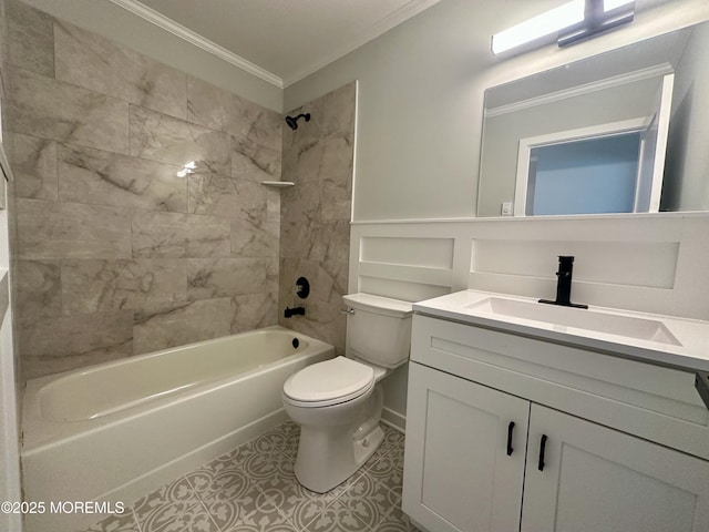 full bathroom featuring tiled shower / bath combo, vanity, toilet, crown molding, and tile patterned floors