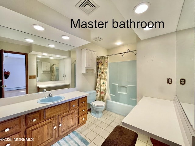 full bathroom featuring vanity, toilet, tile patterned flooring, and shower / bath combo with shower curtain