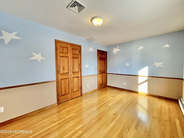 empty room featuring light hardwood / wood-style flooring