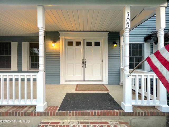 705 Princeton Rd, Lanoka Harbor, NJ 08734 - property entrance featuring covered porch