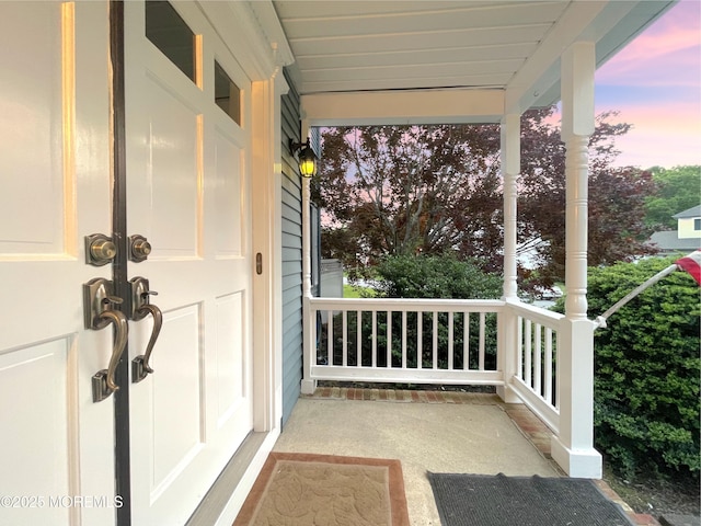 705 Princeton Rd, Lanoka Harbor, NJ 08734 - balcony at dusk with a porch