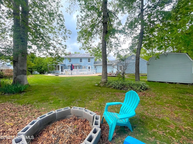 705 Princeton Rd, Lanoka Harbor, NJ 08734 - view of grassy yard featuring an outbuilding