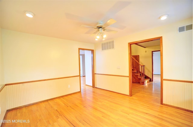 705 Princeton Rd, Lanoka Harbor, NJ 08734 - spare room featuring wood finished floors, stairway, and ceiling fan