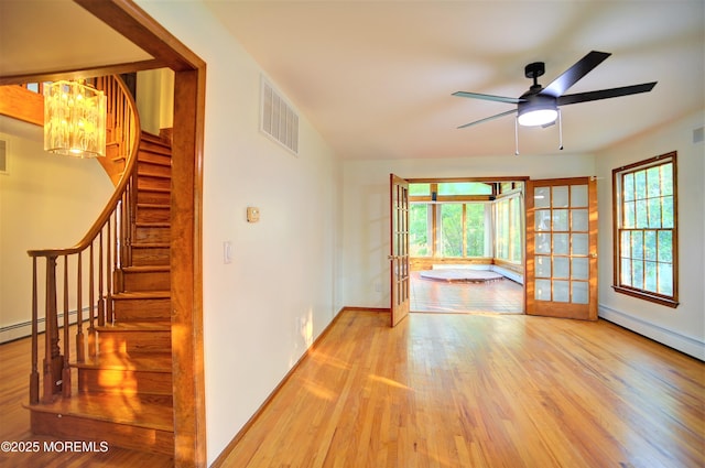 705 Princeton Rd, Lanoka Harbor, NJ 08734 - unfurnished room with wood finished floors, stairs, ceiling fan, and baseboards