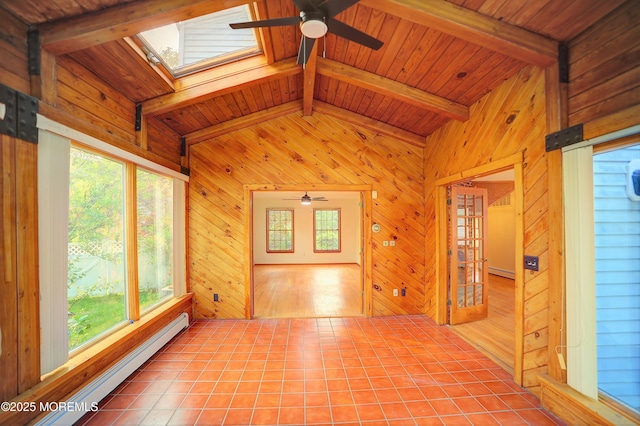 705 Princeton Rd, Lanoka Harbor, NJ 08734 - unfurnished room featuring a ceiling fan, baseboard heating, wood walls, wood ceiling, and a skylight