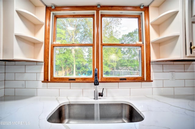 705 Princeton Rd, Lanoka Harbor, NJ 08734 - kitchen featuring open shelves, a sink, and light stone counters
