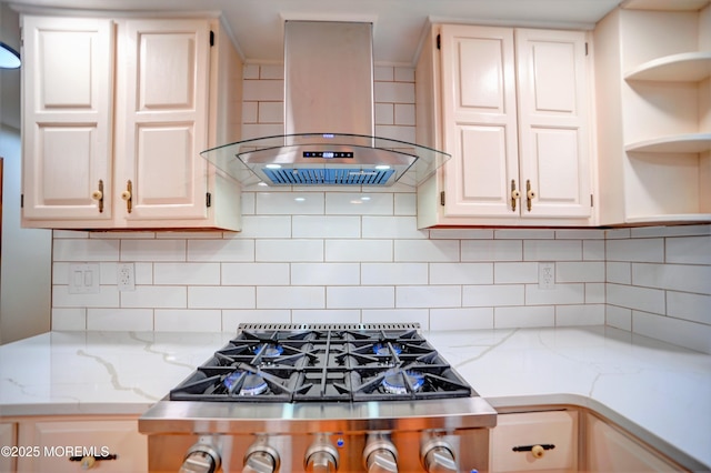 705 Princeton Rd, Lanoka Harbor, NJ 08734 - kitchen with island range hood, open shelves, stainless steel gas cooktop, tasteful backsplash, and light stone counters