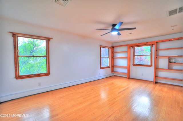 705 Princeton Rd, Lanoka Harbor, NJ 08734 - empty room featuring light wood-style floors, a ceiling fan, baseboard heating, and baseboards