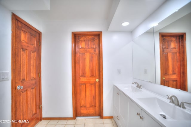 705 Princeton Rd, Lanoka Harbor, NJ 08734 - bathroom with double vanity, baseboards, and tile patterned floors