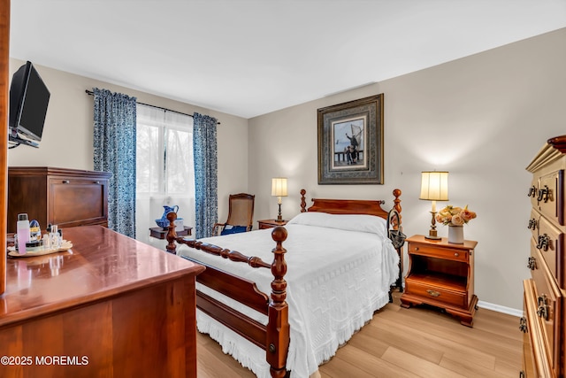 bedroom featuring light wood-type flooring