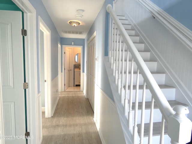 hallway featuring light wood-type flooring