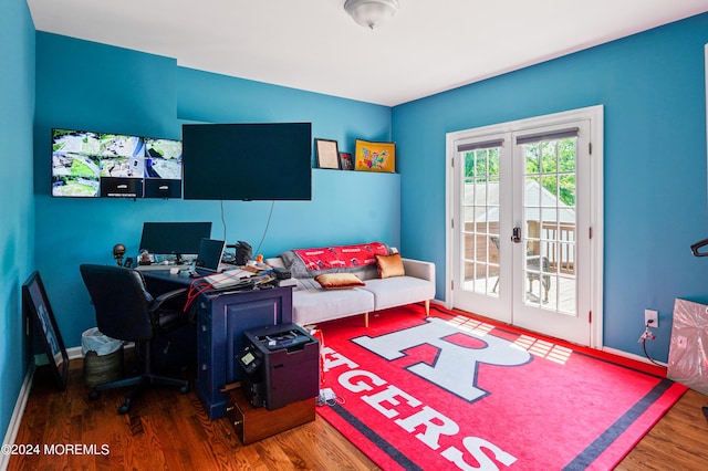 office featuring french doors, baseboards, and wood finished floors