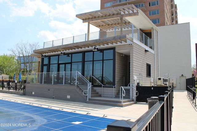 exterior space featuring a community pool