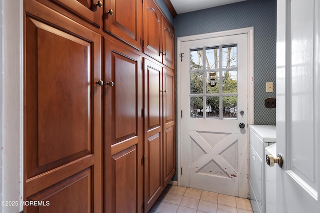 entryway featuring light tile patterned floors