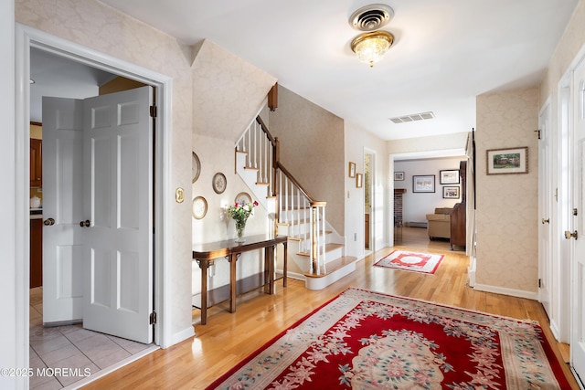 foyer entrance featuring light hardwood / wood-style floors