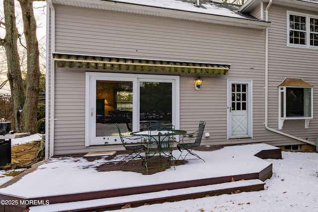 view of snow covered property