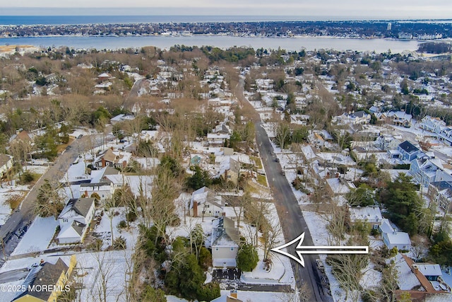 drone / aerial view featuring a water view