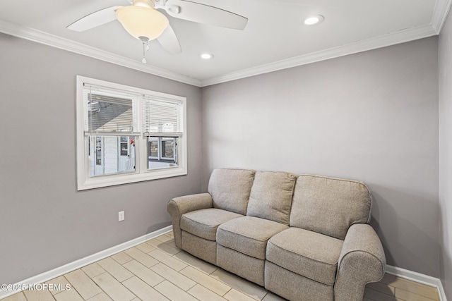 living area with ceiling fan, ornamental molding, and light wood-type flooring