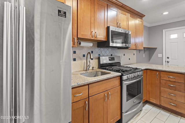 kitchen with sink, appliances with stainless steel finishes, light stone counters, ornamental molding, and light tile patterned flooring