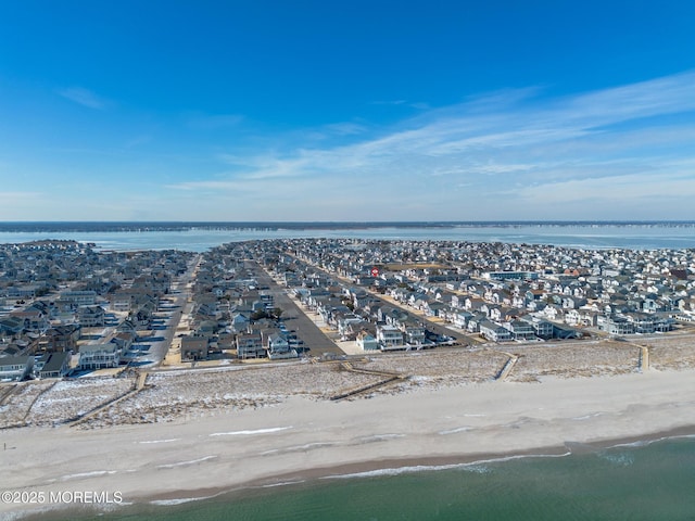 aerial view featuring a beach view and a water view