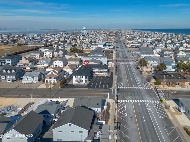 aerial view featuring a residential view and a water view