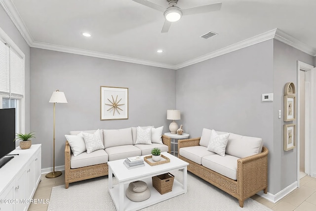 living room featuring ornamental molding, visible vents, baseboards, and light tile patterned floors