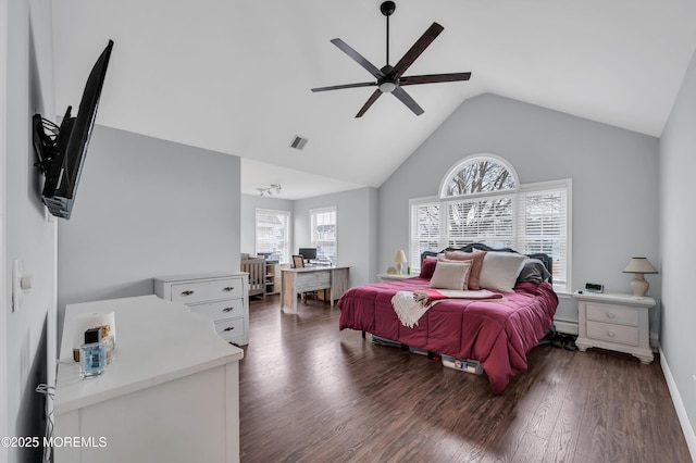 bedroom featuring dark hardwood / wood-style flooring, lofted ceiling, ceiling fan, and a baseboard radiator