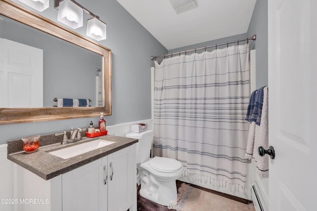 bathroom featuring vanity, a shower with shower curtain, toilet, and baseboard heating