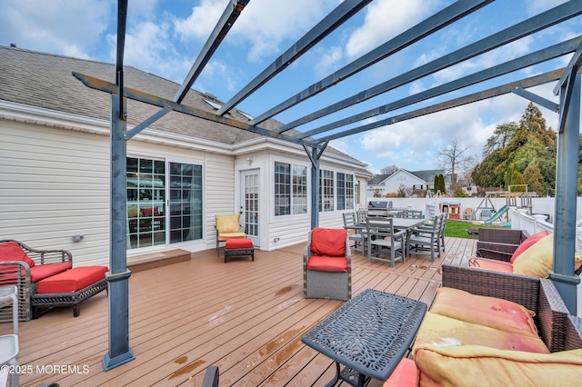 wooden terrace featuring an outdoor living space, a playground, and a pergola