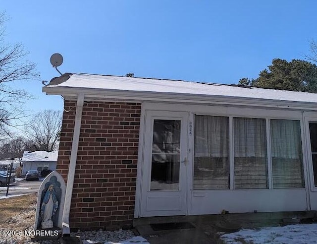 view of snow covered property