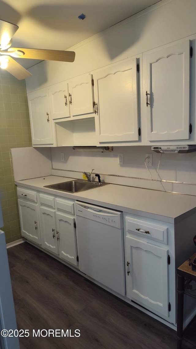 kitchen featuring white cabinetry, dark hardwood / wood-style floors, white dishwasher, and sink