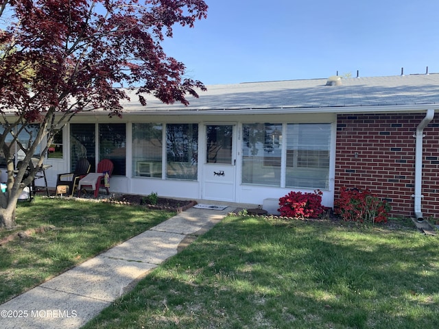 1211 Shetland Dr Unit C, Lakewood, NJ 08701 - view of front of property with brick siding, roof with shingles, and a front lawn