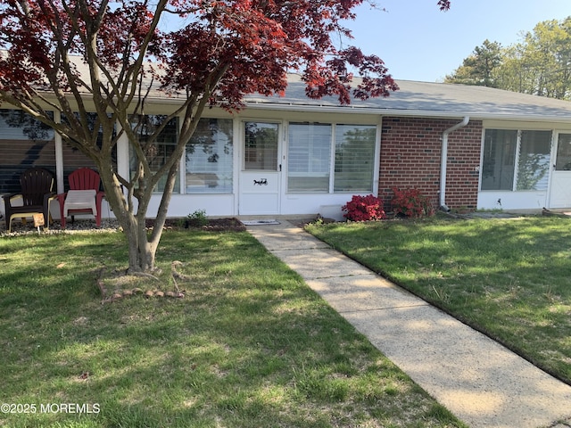 1211 Shetland Dr Unit C, Lakewood, NJ 08701 - ranch-style home with brick siding and a front yard